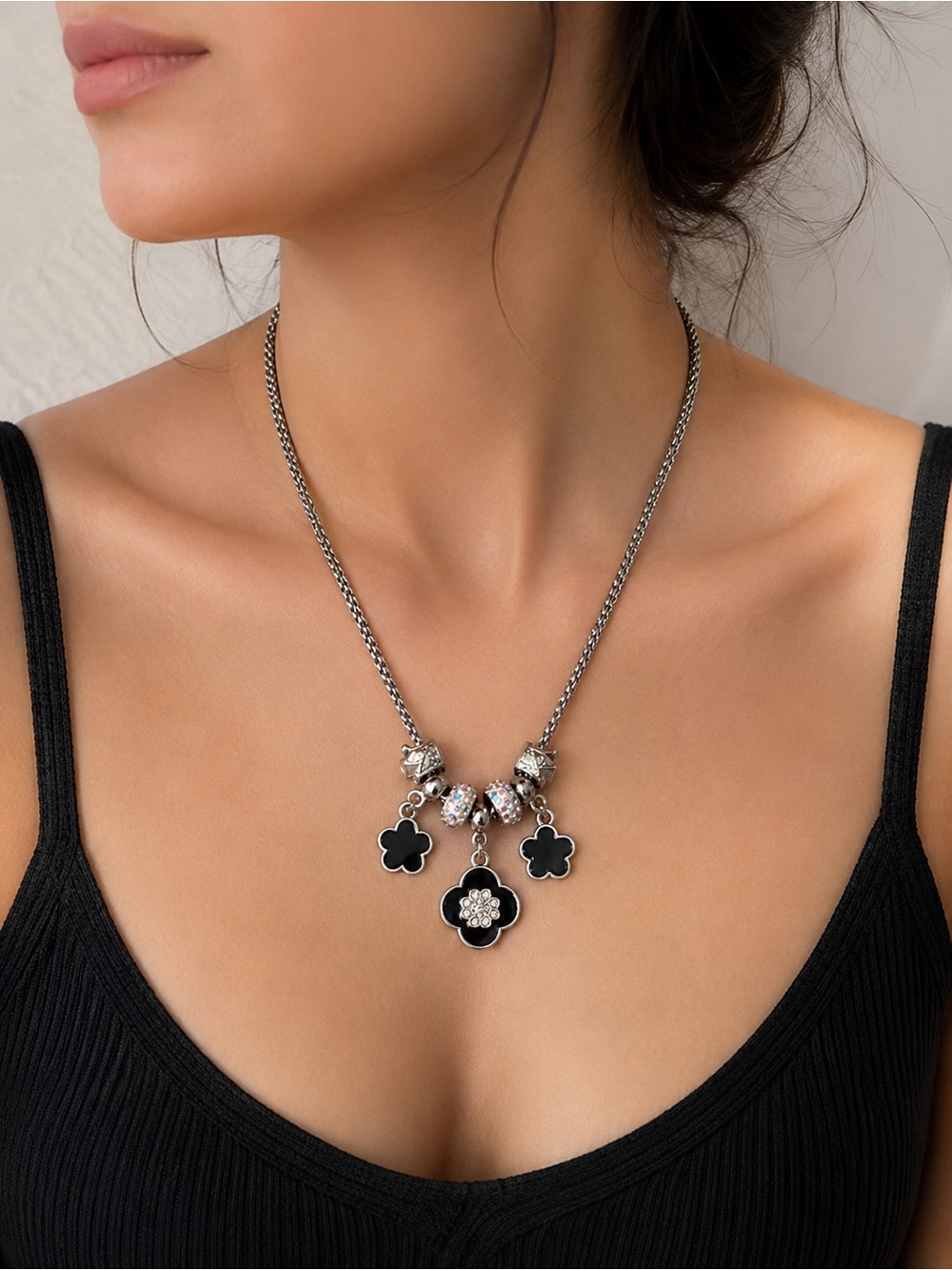 Silver Necklace with Black Clover Charms